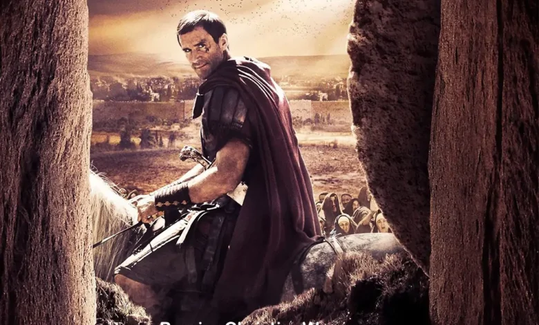 Scene from the movie "Risen" (2016) featuring a Roman soldier on horseback, perfect for those looking to download Risen 2016 movie.